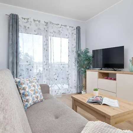 Beige And Pink In With Balcony And Desk By Renters
